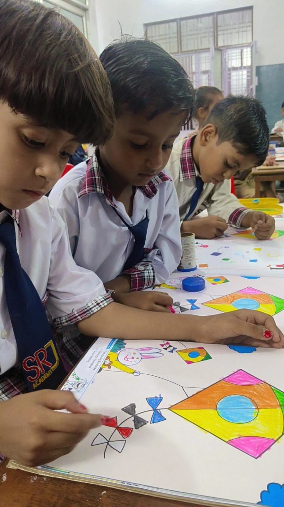 SRJ Academy students kite colouring group activity